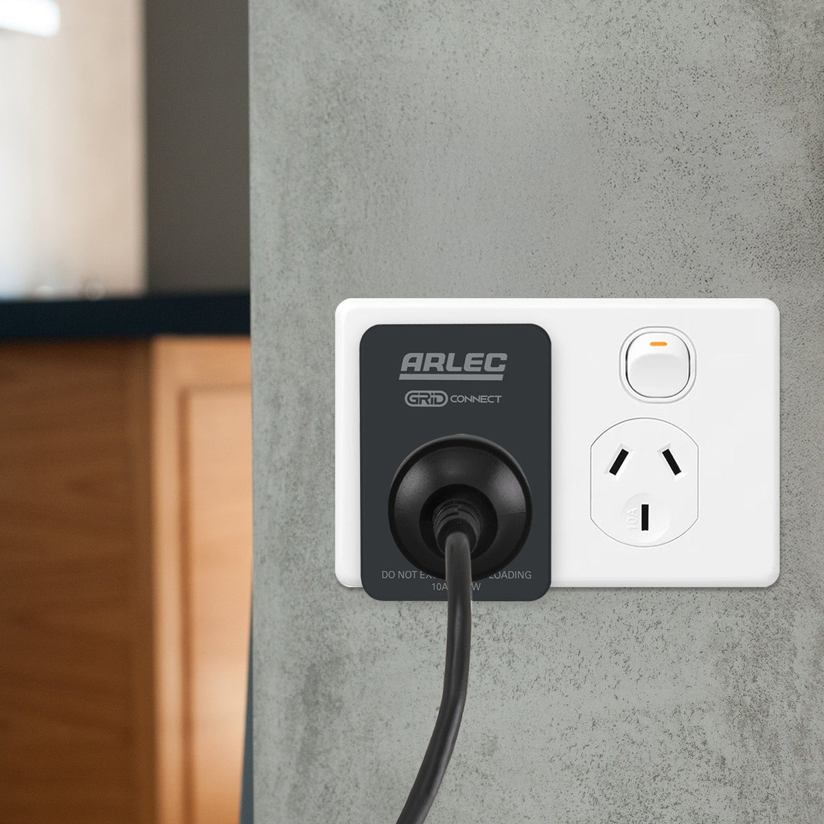 Arlec PC191BKHA black smart plug - in use - manufacturer reference image, not the actual used item