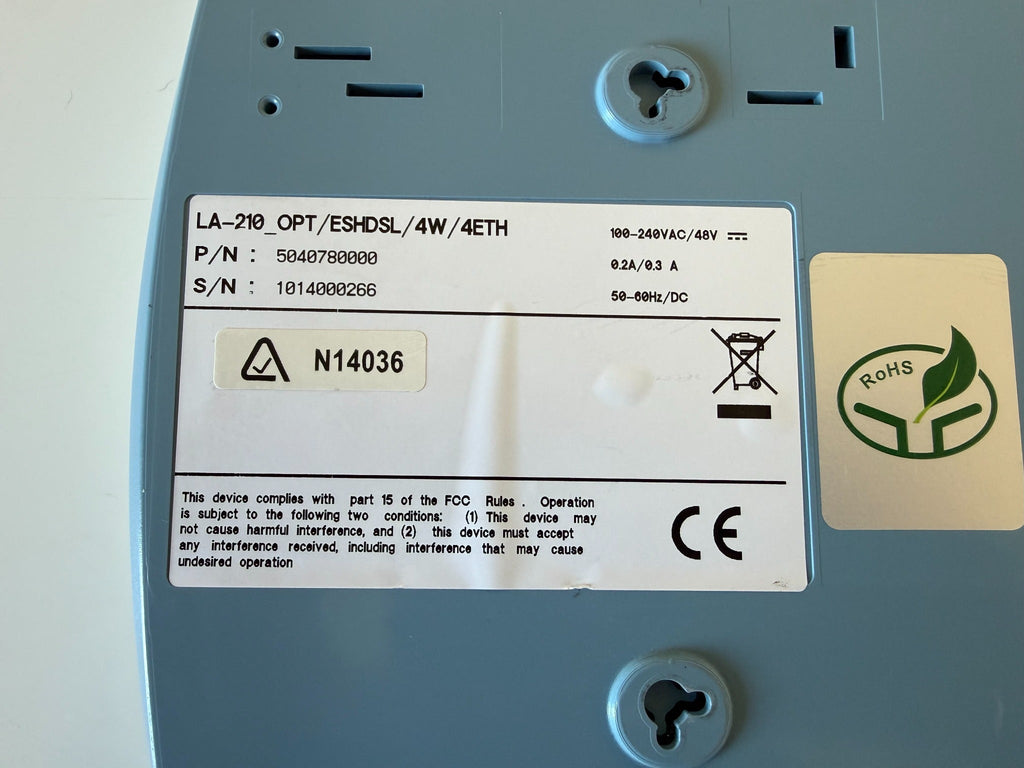 Original unedited RAD LA-210_OPT/ESHDSL/4W/4ETH identification label showing part number 5040780000