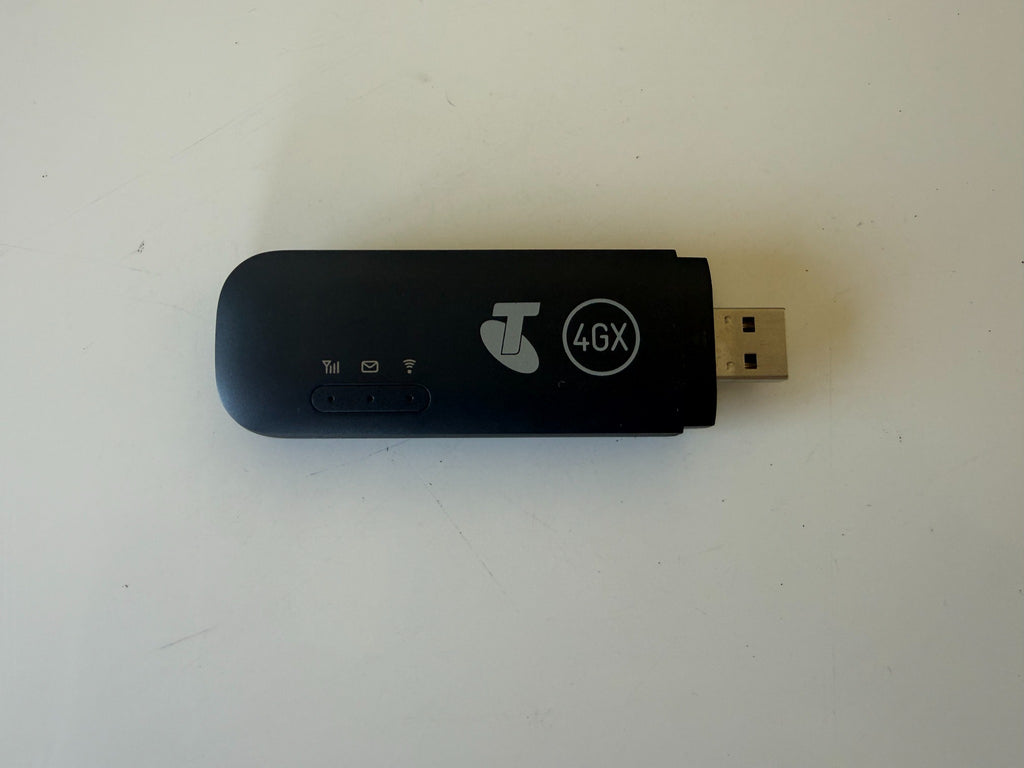 Actual used Telstra E8372H 4GX USB Pro, black, USB protective cap missing